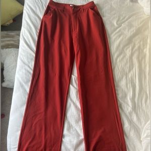 WeWoreWhat rusty colored trousers. Matching top listed